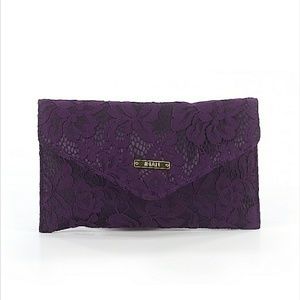 NWOT IMAN purple lace clutch